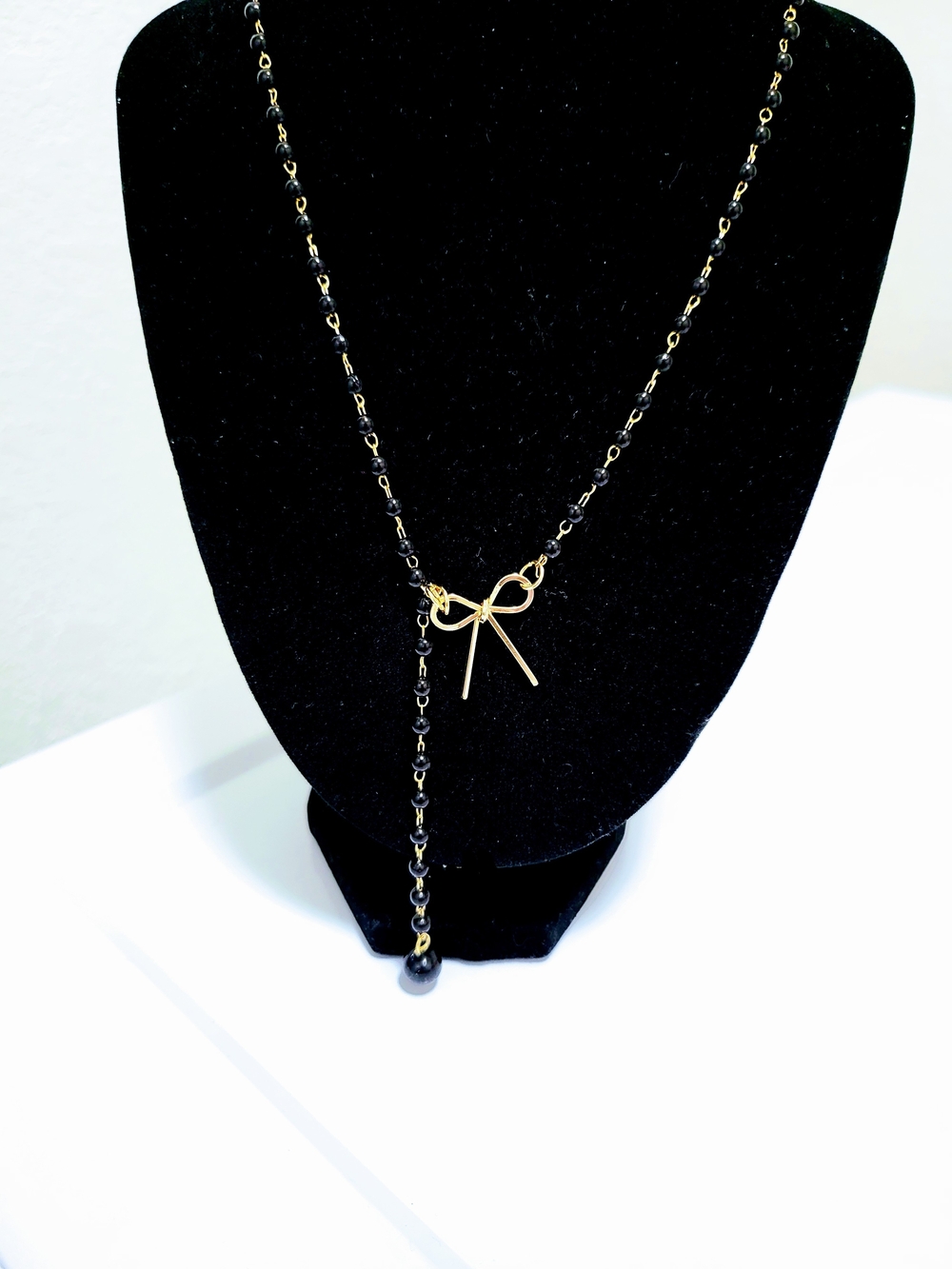 Gold Bow Lariat Necklace with Black Beads - Women Jewelry